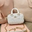 미우미우 MIUMIU 2023 SS 마틀라쎄 미니 토트 탑 핸들백 화이트 5BP077 커스텀급